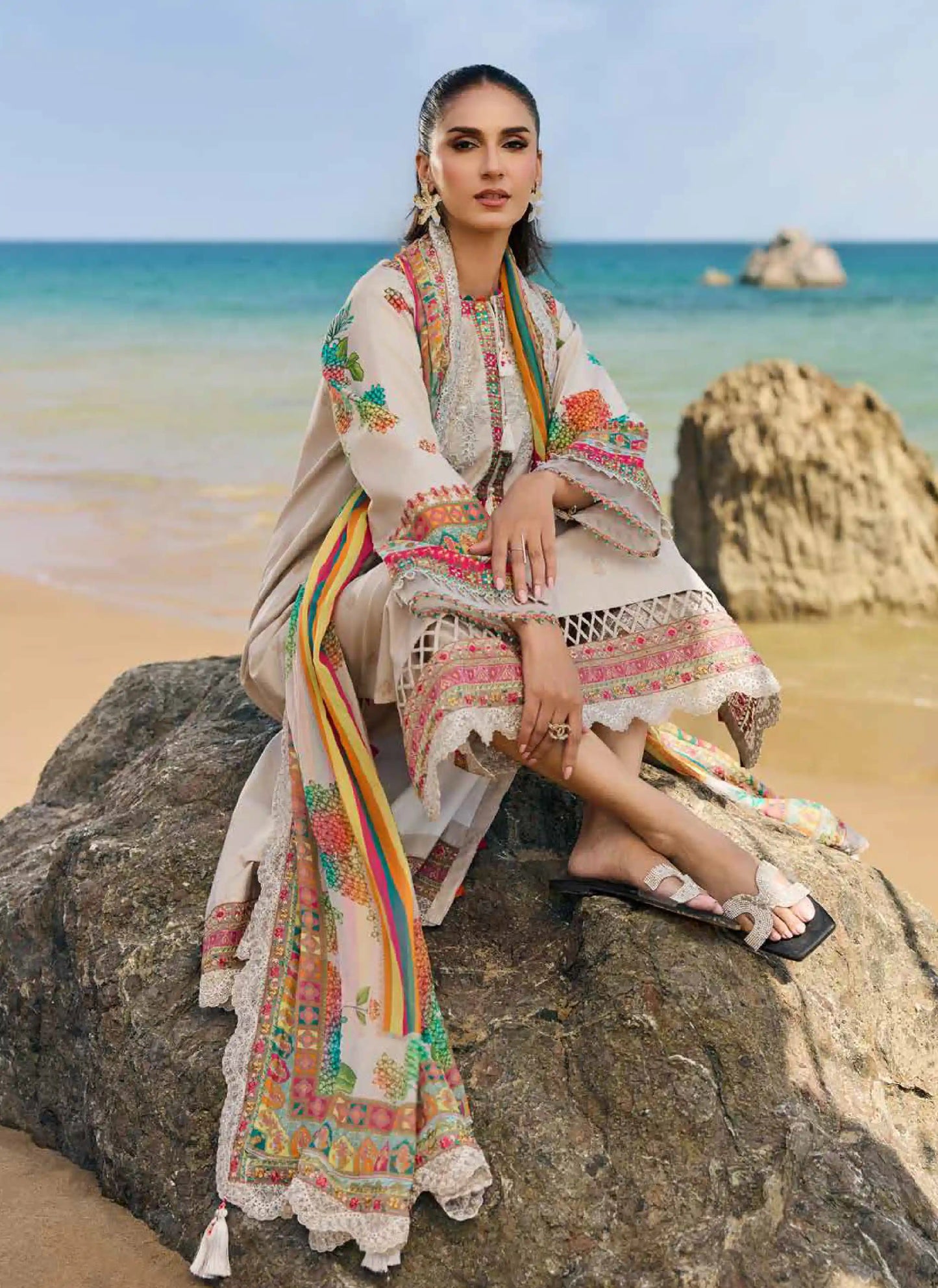 Detailed profile look showcasing the premium printed chiffon dupatta fall and matching printed cotton trousers pattern details.
