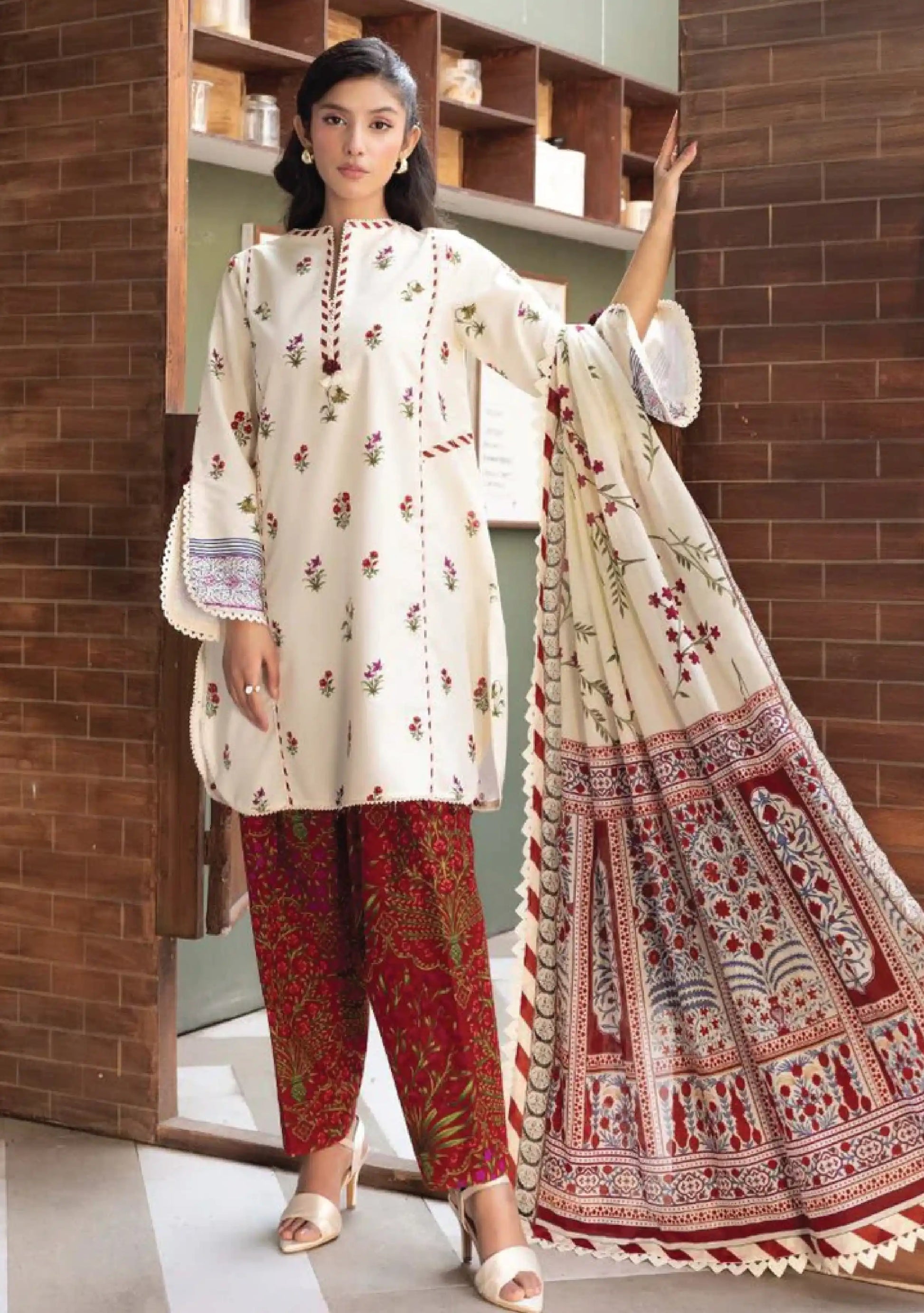 Full-length front profile studio shot of M Basic by Elaheh Volume 4 unstitched collection code MB-ELHV4-01 white casual lawn suit.