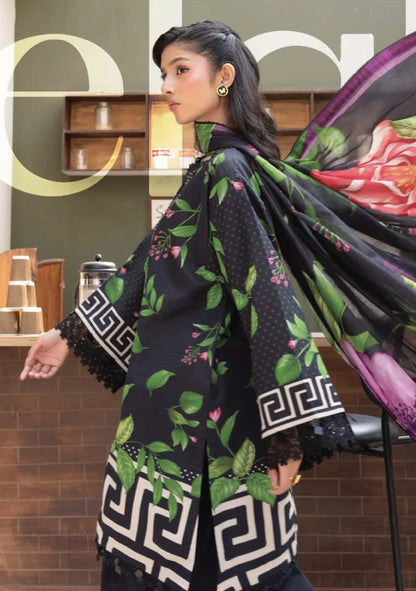 Side profile movement shot showing the large purple and pink floral prints on the black voile dupatta code MB-ELHV4-03.