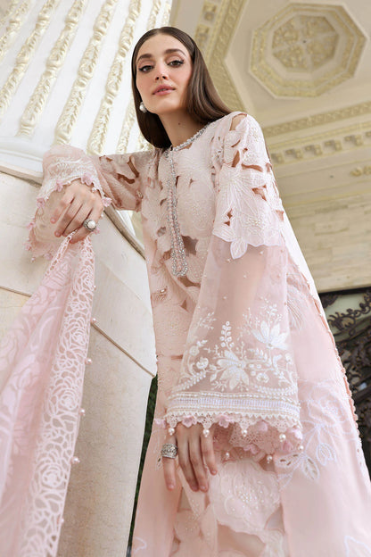 Detailed perspective view focusing on the embroidered lawn sleeves cutouts and pearl hanging trims along the shirt hem cuff code D2.