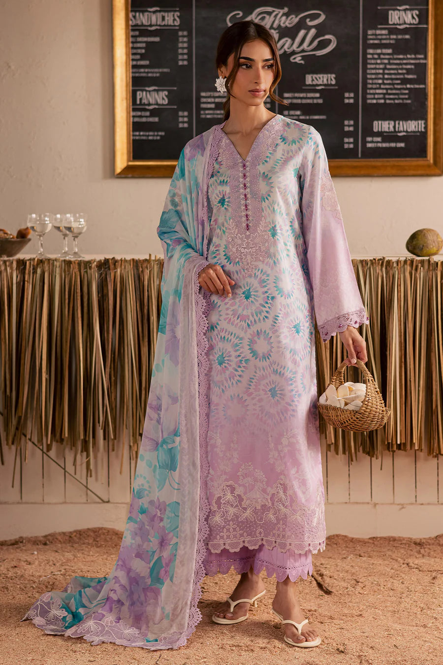 Half-length model view highlighting the intricate lavender embroidered lawn shirt panels from Nureh collection NSG222.