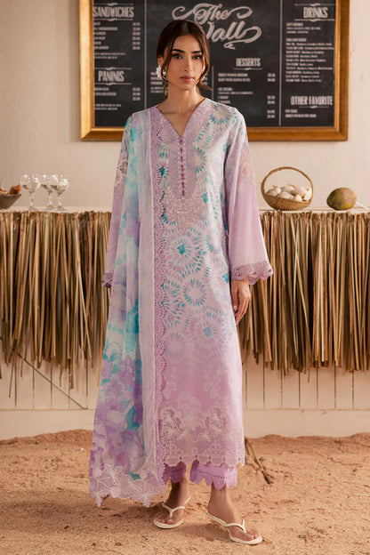 Close-up focus on the clean contrasting floral neckline embroidery work on lavender lawn fabric NSG222.