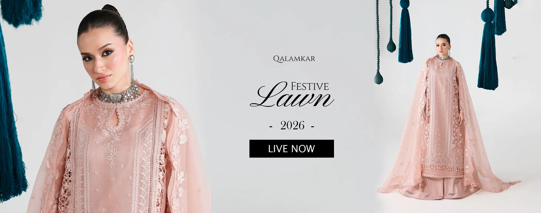 Wide homepage slider banner showcasing the official launch of Qalamkar Festive Lawn 2026 collection featuring a luxury unstitched three-piece pastel pink rocket net suit with intricate embroidery and a matching cotton net dupatta.