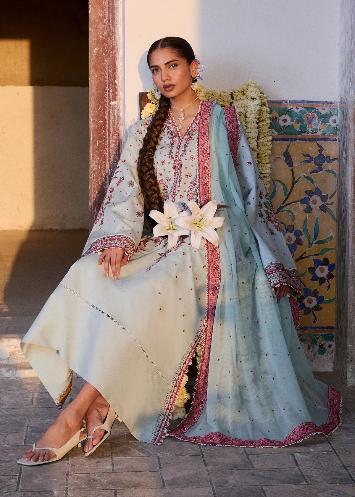 Full sitting studio presentation highlighting the delicate rose-pink neckline embroidery parameters and color-blocked chiffon dupatta.