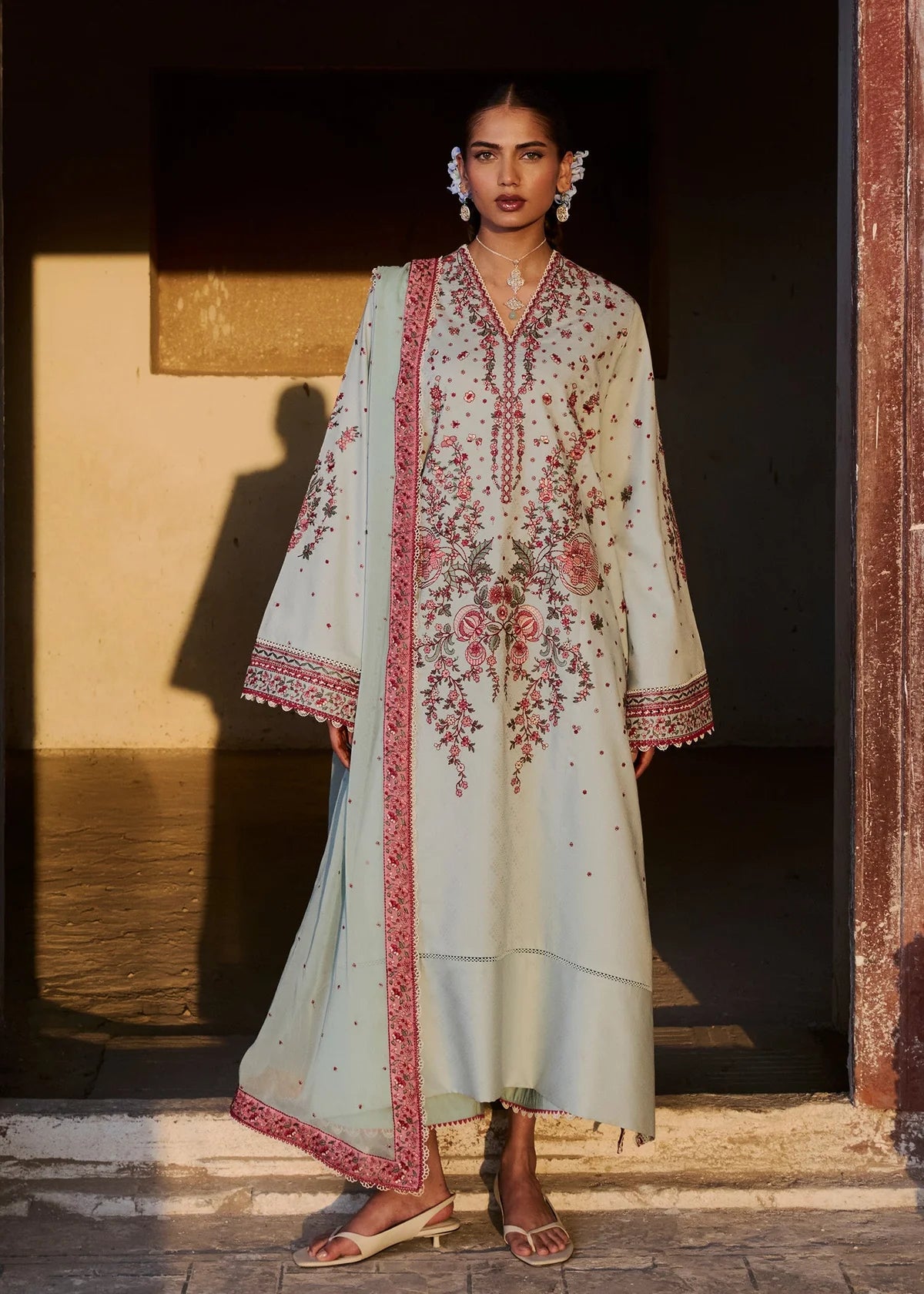 Full-length front view of ZAN Spring Summer 2026 unstitched luxury collection design Firuz in serene aqua blue.