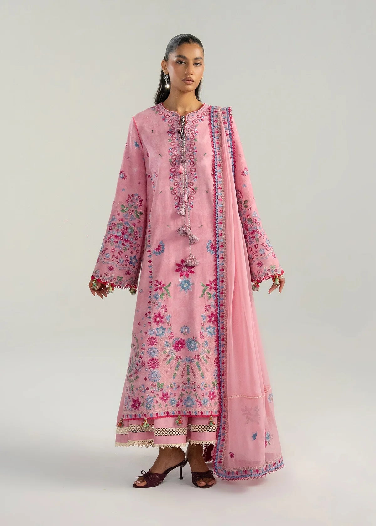 Half-length model view displaying the soft fall of the lightweight dyed chiffon dupatta paired with the long jacquard shirt.