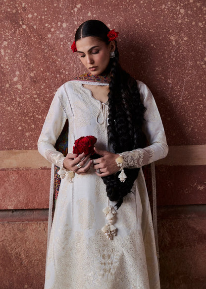Close-up front view highlighting the detailed white-on-white self-embroidery work across the bodice and sleeves.