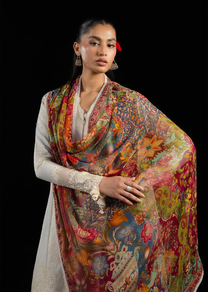 Studio portrait showcasing the vivid colors and multi-toned floral arrays of the premium printed chiffon dupatta drapery.
