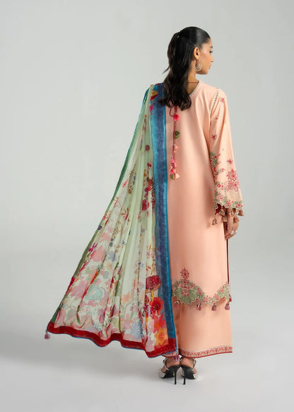 Rear model view showcasing the clean back panel finish and the long draping fall of the printed chiffon dupatta.